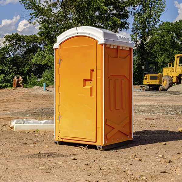 how often are the portable restrooms cleaned and serviced during a rental period in Grass Creek